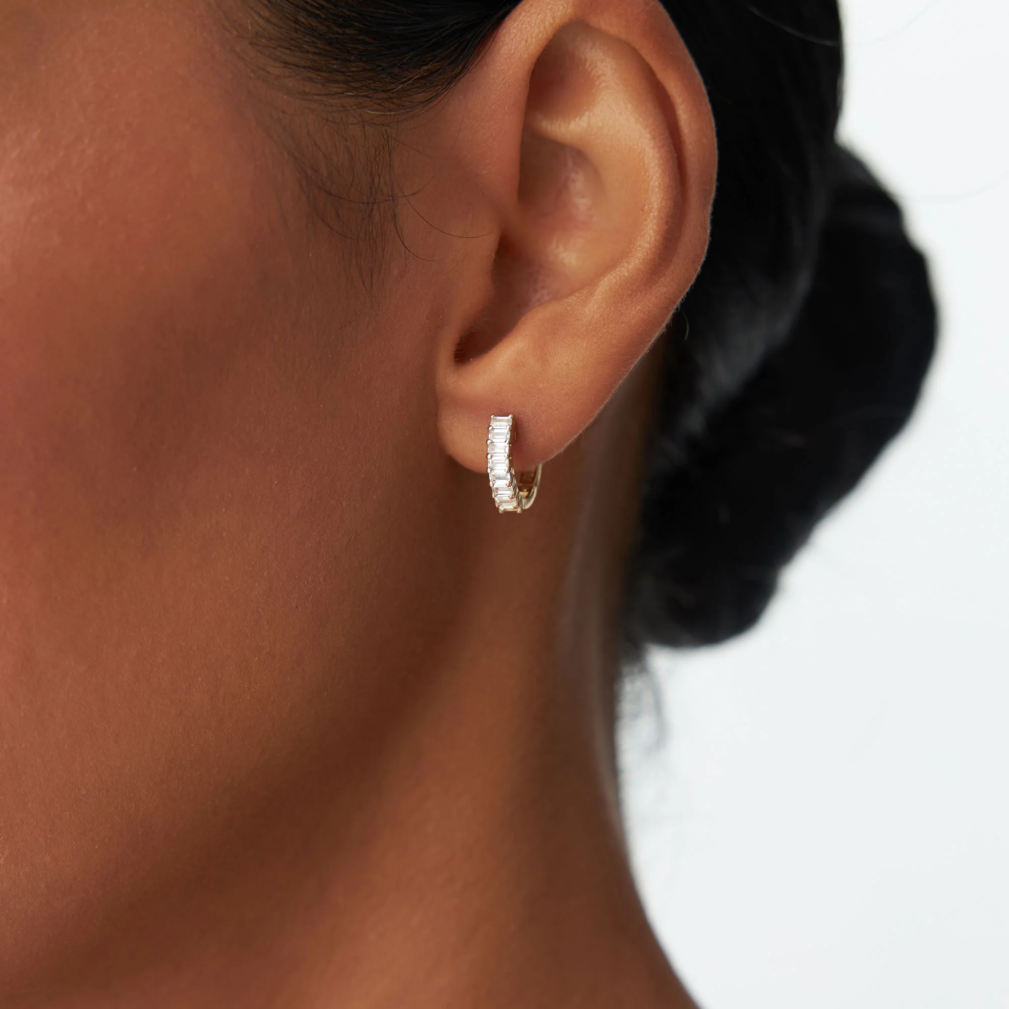 14k Distinctive Baguette Diamond Huggies - Image 2